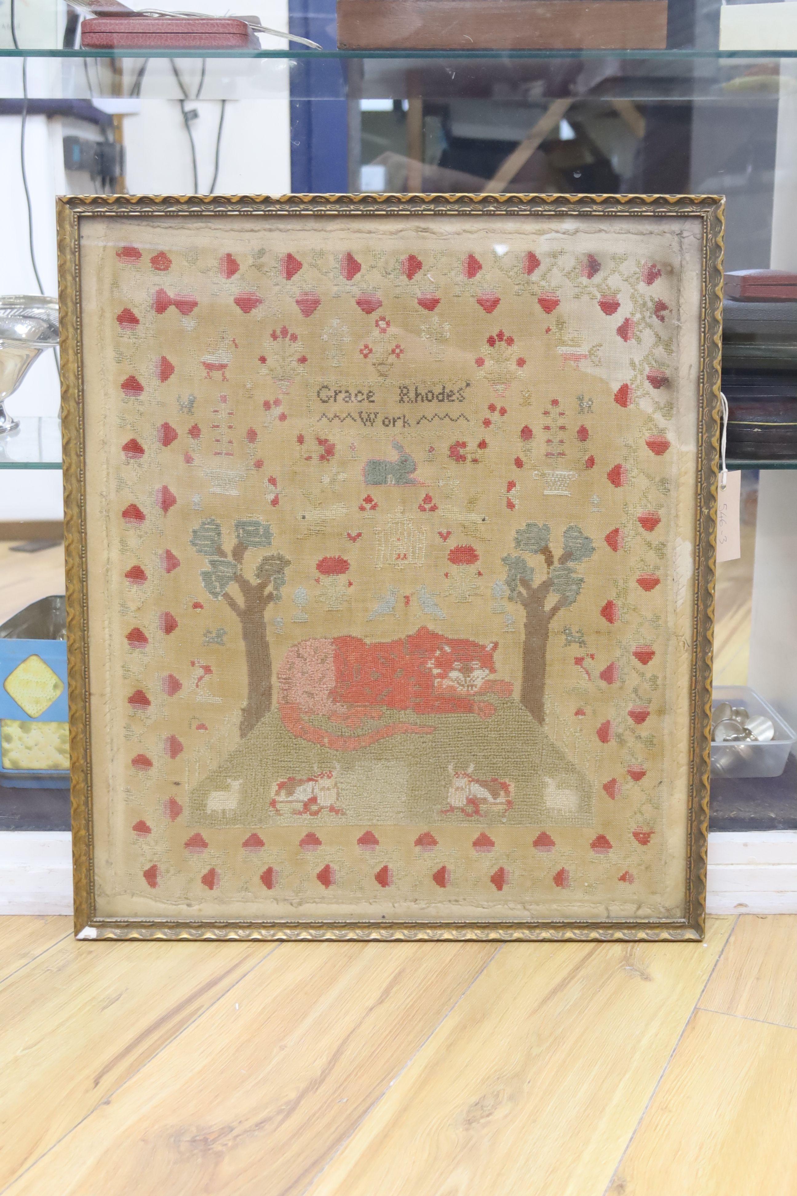 A Victorian needlework sampler by Grace Rhodes, framed, overall 57 x 49cm